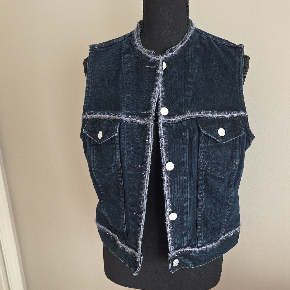 Dark Denim Sleeveless Vest with Silver Eyelash Trim.